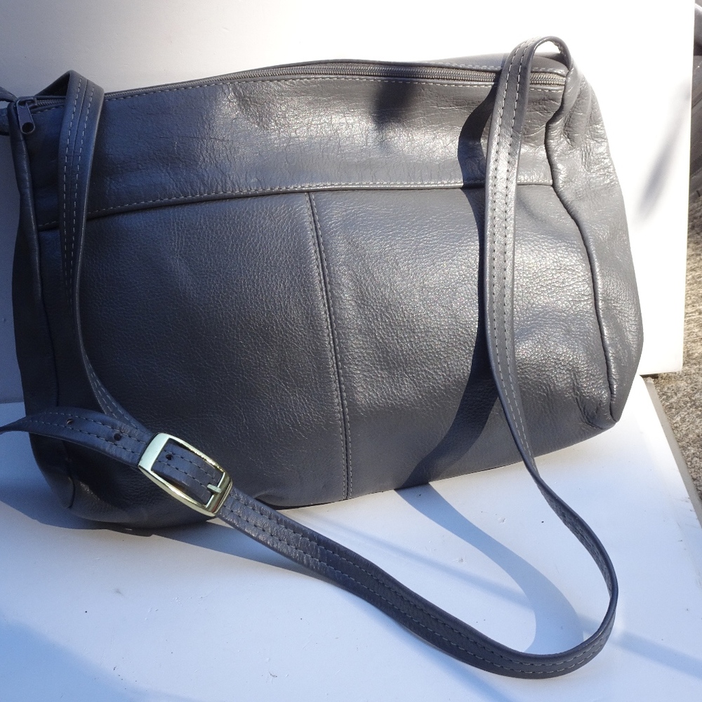 Gray leather women's purse handbag.